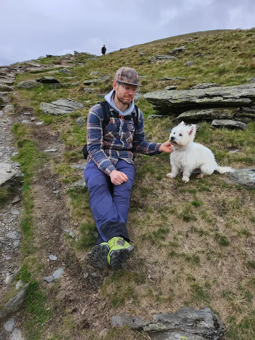 Ewen on a walk with a dog
