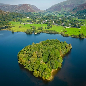 View across the River Rothay towards Grasmere in the Lake District — representing Protected Guest Slots on the Be a Guest page of Sukanya The Podcast for microbusinesses and changemakers.