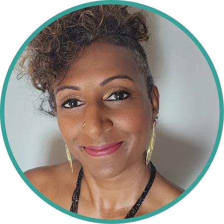 Sukanya, host of Sukanya The Podcast, smiling at the camera in a professional headshot for the podcast website.