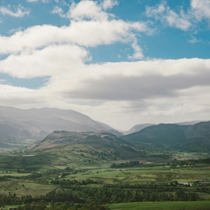 View of Wrynose Pass in the Lake District — featured on the Be a Guest page of Sukanya The Podcast, symbolising a quiet yet powerful journey for feature podcast guests.